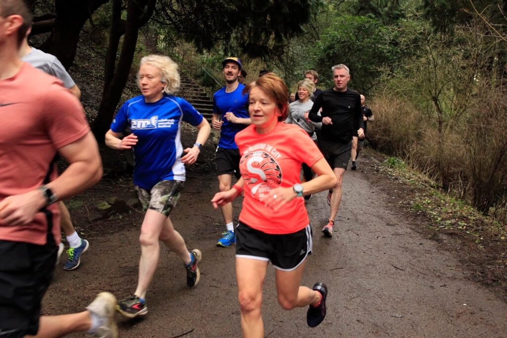 Helen Bell running Jesmond Dene parkrun 